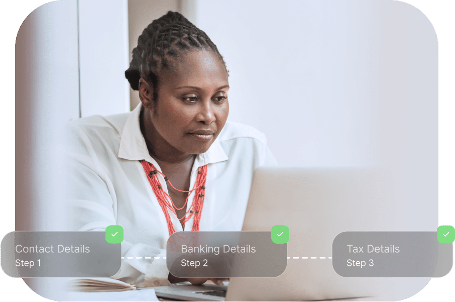 A person sits at a desk working on a laptop. Overlaid are progress steps labeled 'Contact Details - Step 1,' 'Banking Details - Step 2,' and 'Tax Details - Step 3,' all marked with green check marks.