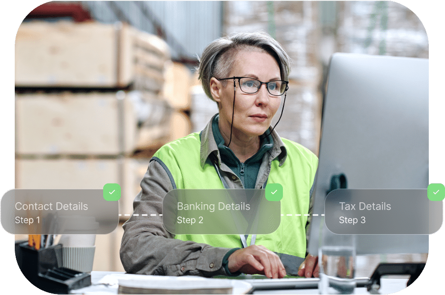 A person in a high-visibility vest works on a computer. Three outlined steps with checkmarks overlay the image: Contact Details, Banking Details, and Tax Details.