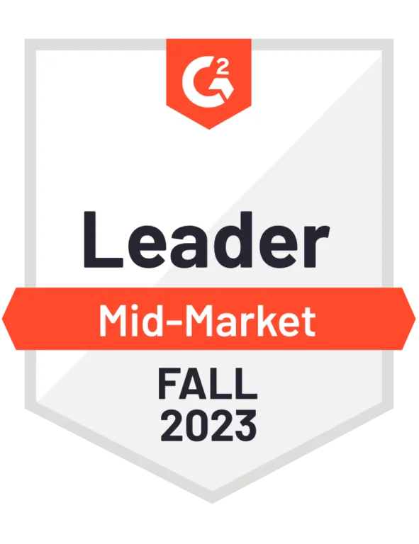 G2 badge reading “Leader Mid-Market Fall 2023” with a red banner and G2 logo at the top.