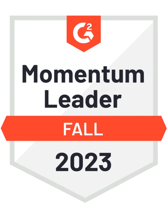 A G2 award badge labeled "Momentum Leader Fall 2023" in black and orange text on a white background.