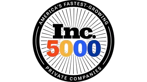 The number 5000 is displayed in large, bold digits with each digit in a different color: red, orange, yellow, and blue, on a black background.